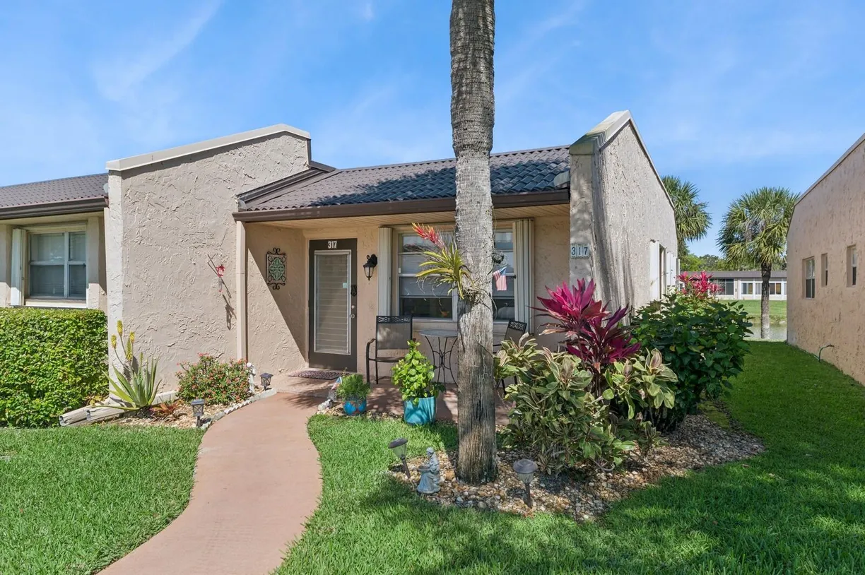 South Florida Real Estate | View 317 Golden River Drive | 2 Beds, 2 Baths
