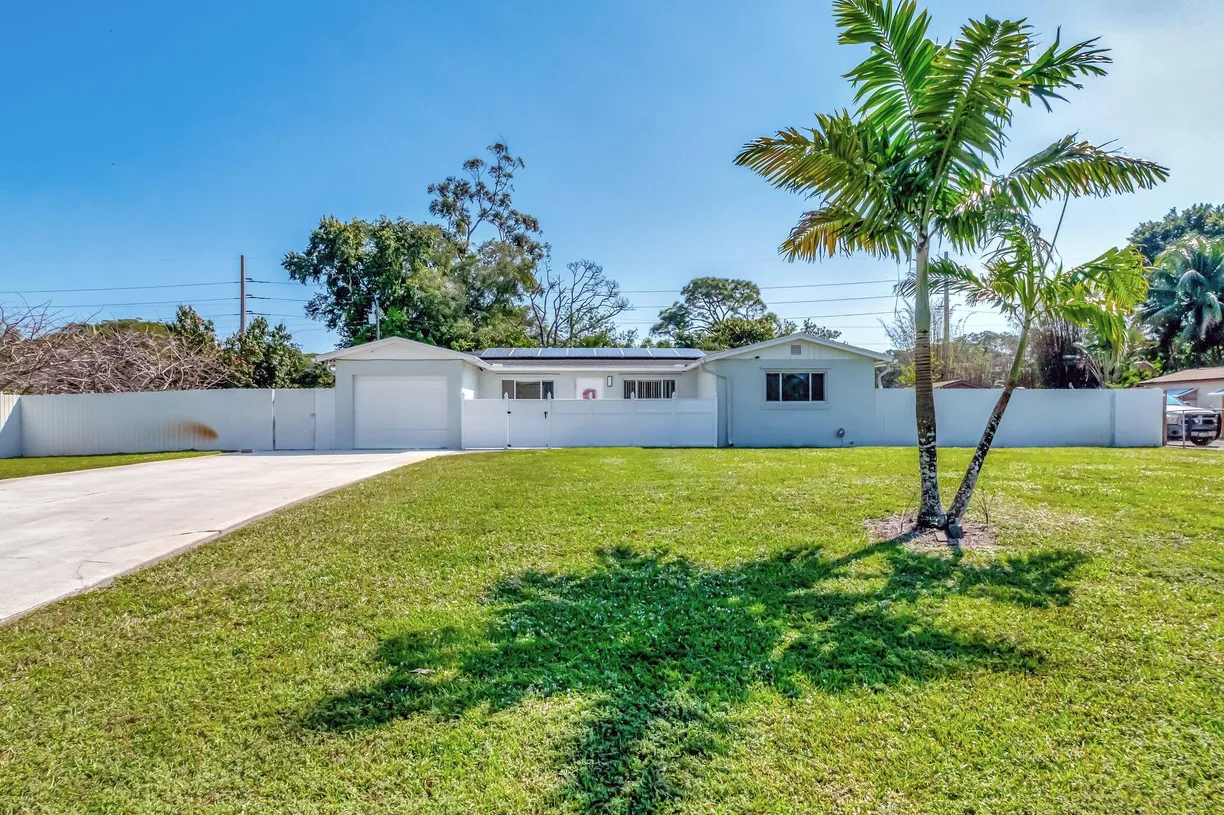 South Florida Real Estate | View 628 Madeline Drive | 4 Beds, 2 Baths