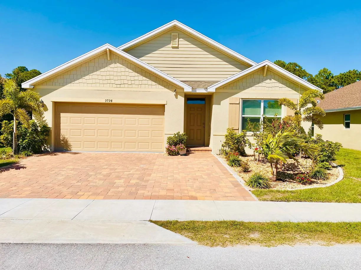 South Florida Real Estate | View 9796 Palm Breezes Drive | 4 Beds, 2 Baths