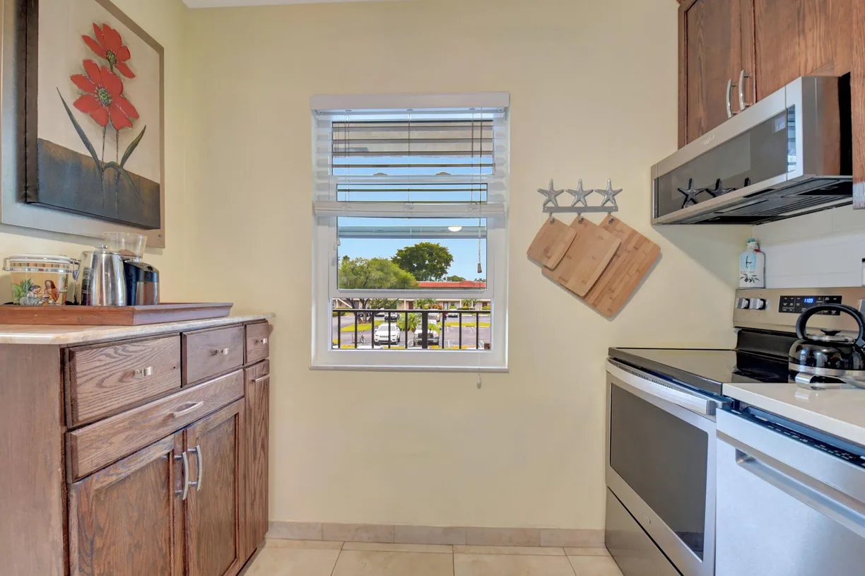 South Florida Real Estate | View 22 Abbey Lane, 208 | Listing