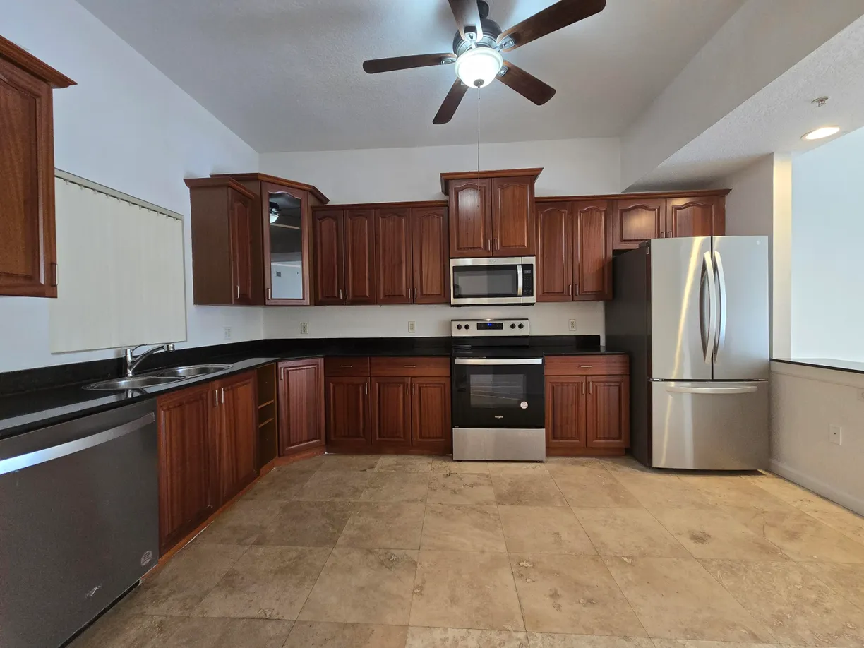 South Florida Real Estate | View 1620 Presidential Way, 106 | 3 Beds, 2 Baths