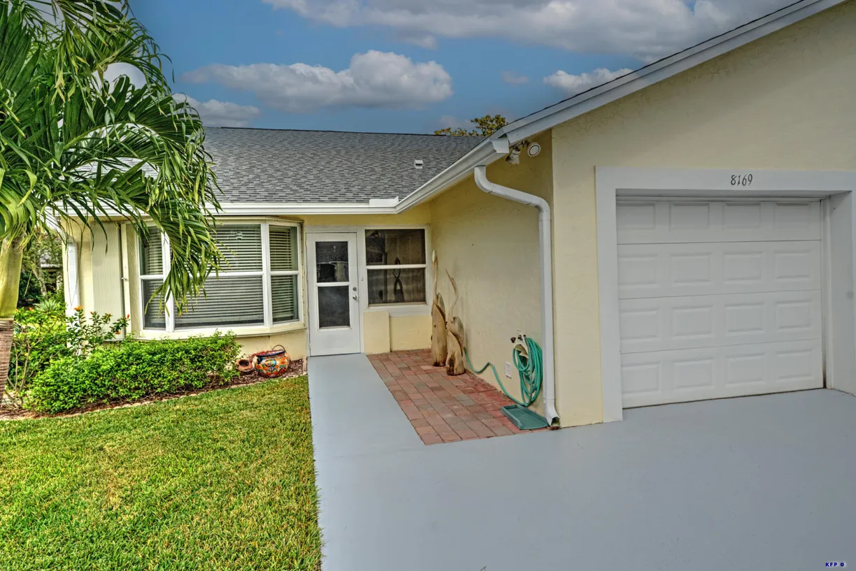 South Florida Real Estate | View 8169 SE Fox Hill Place | 2 Beds, 2 Baths