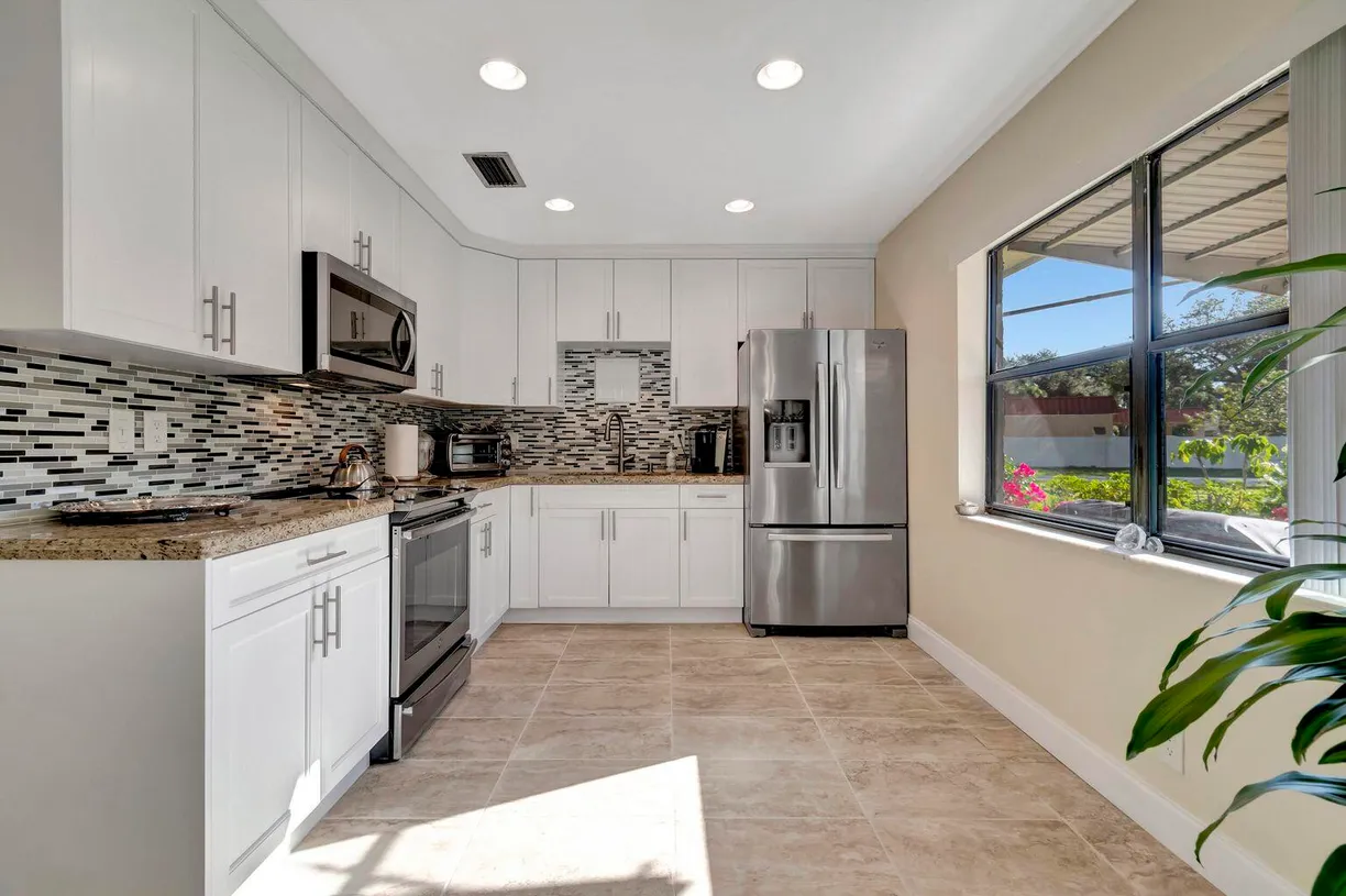 South Florida Real Estate | View 1502 Palmland Drive, 1-F | Listing