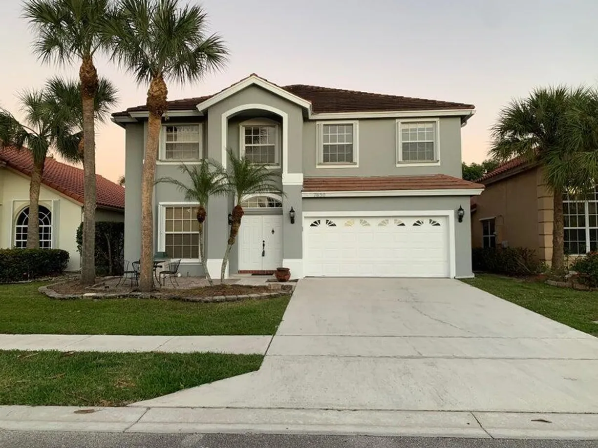 South Florida Real Estate | View 7650 Brunson Circle | 4 Beds, 3 Baths