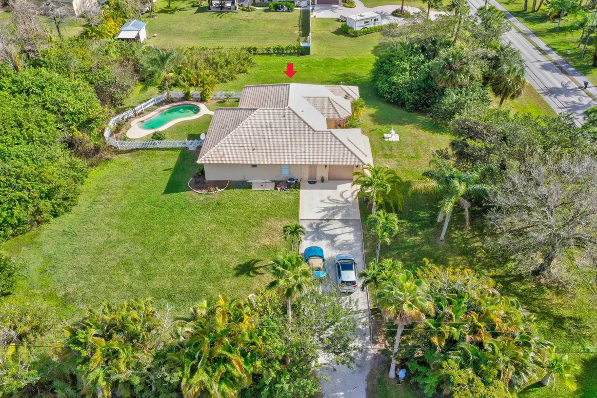South Florida Real Estate | View 8671 155th Place | 4 Beds, 2 Baths