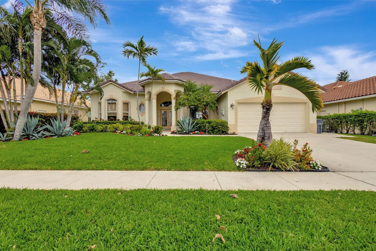 South Florida Real Estate | View 7061 Peninsula Court | 4 Beds, 3 Baths