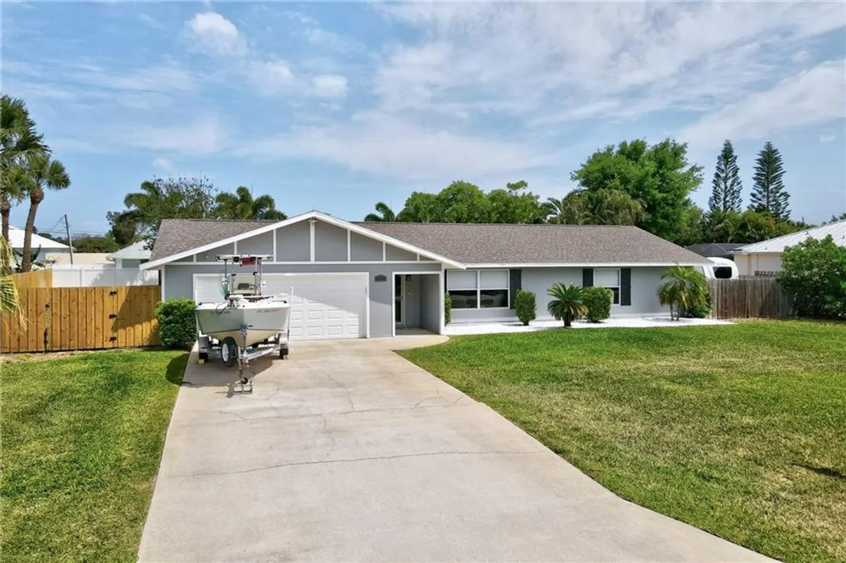 South Florida Real Estate | View 14360 80th Avenue | 3 Beds, 2 Baths
