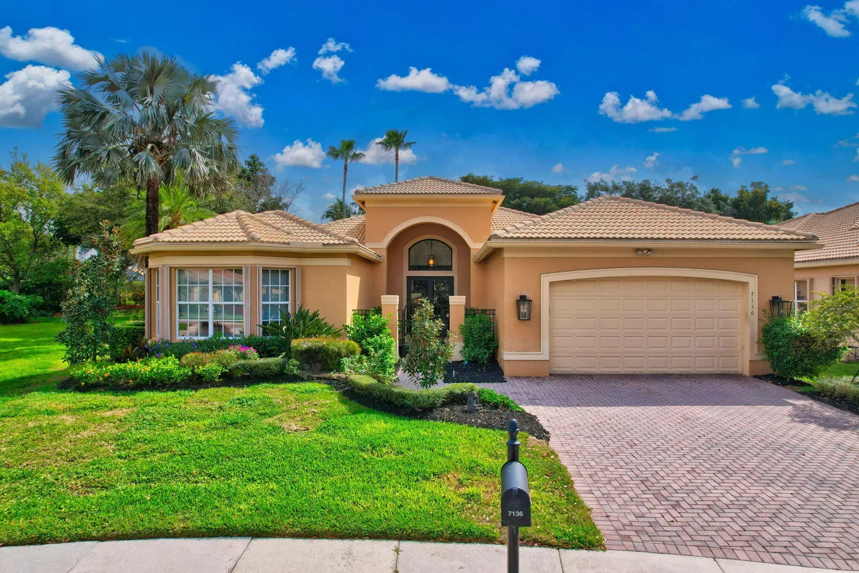 South Florida Real Estate | View 7136 Corning Circle | 3 Beds, 2 Baths