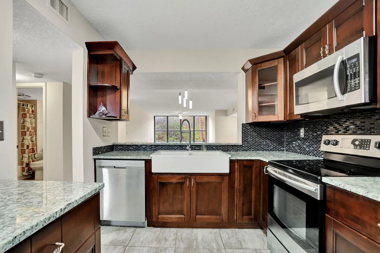 South Florida Real Estate | View 2660 Carambola Circle N, 203 | 2 Beds, 2 Baths