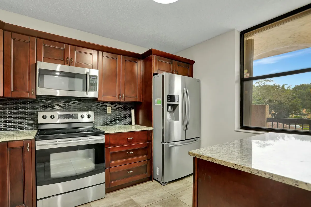 South Florida Real Estate | View 2660 Carambola Circle N, 203 | Listing