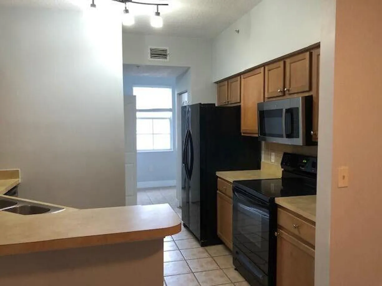 South Florida Real Estate | View 9849 Baywinds Drive, 8208 | 2 Beds, 2 Baths