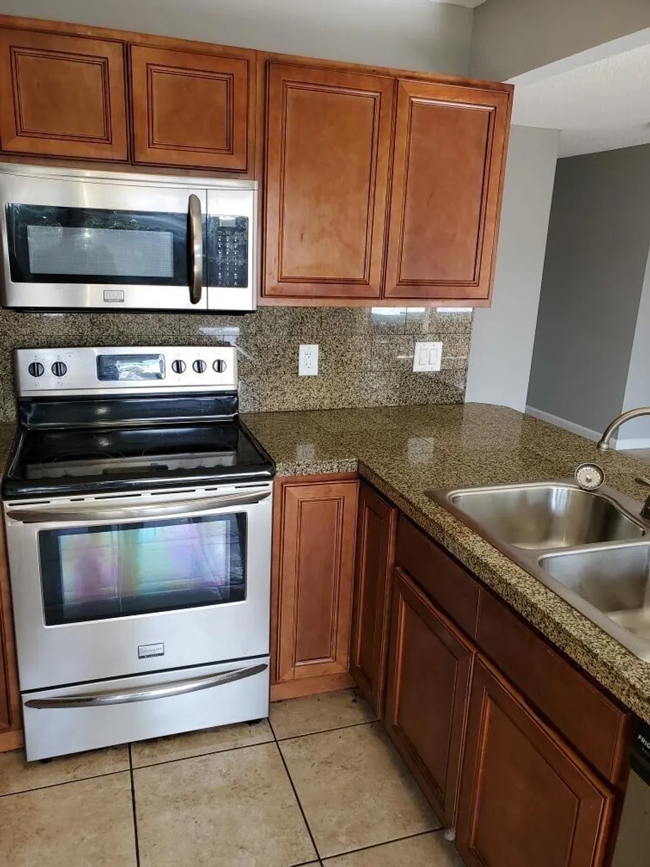 South Florida Real Estate | View 9036 SE Sandy Lane | 3 Beds, 2 Baths