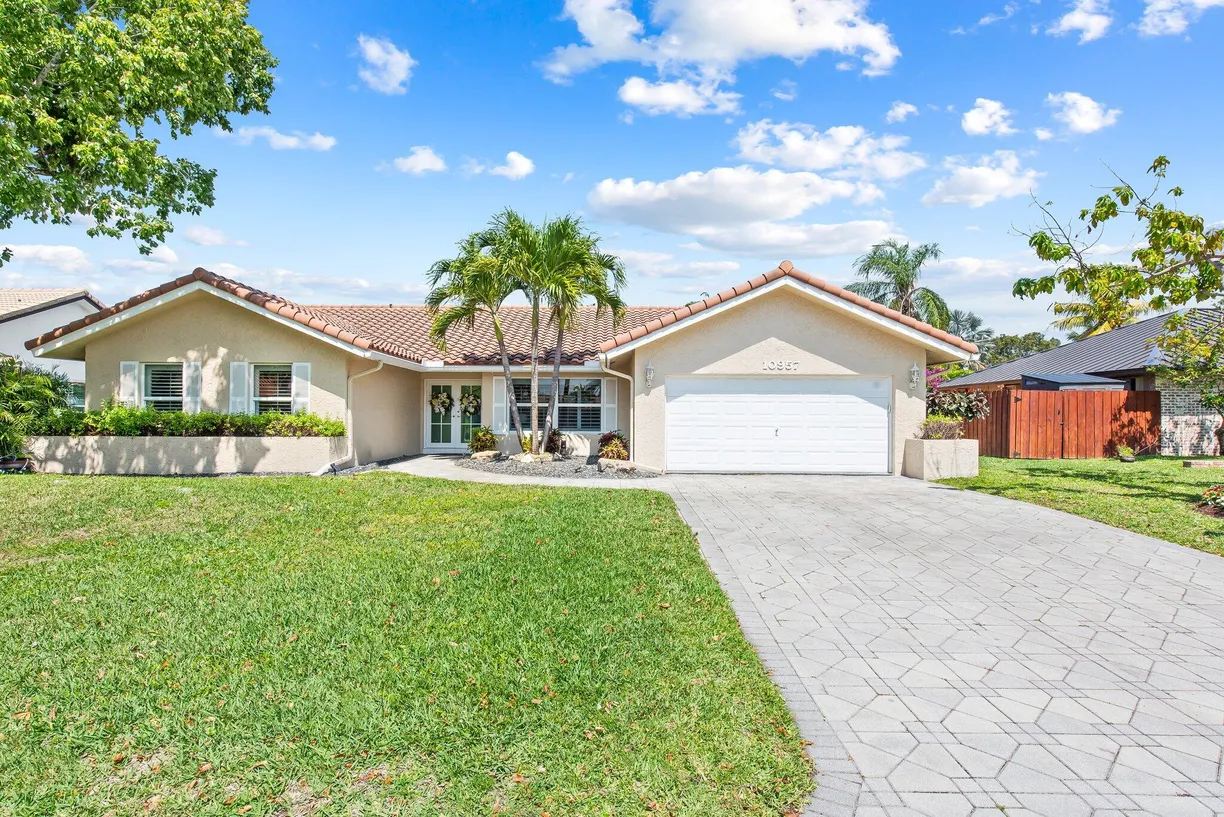 South Florida Real Estate | View 10957 NW 19th Manor | 4 Beds, 2 Baths