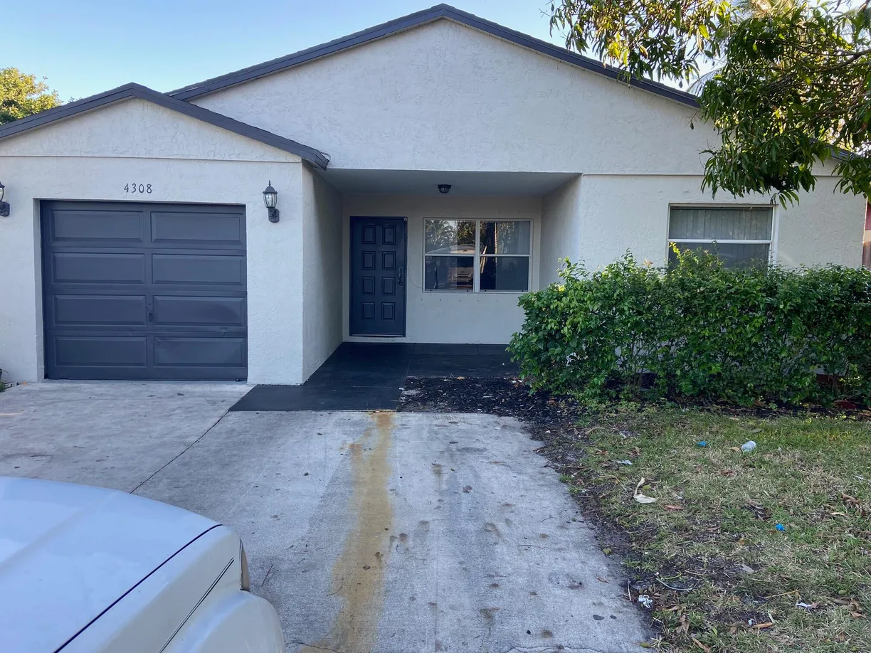 South Florida Real Estate | View 4308 Purdy Lane | 3 Beds, 2 Baths