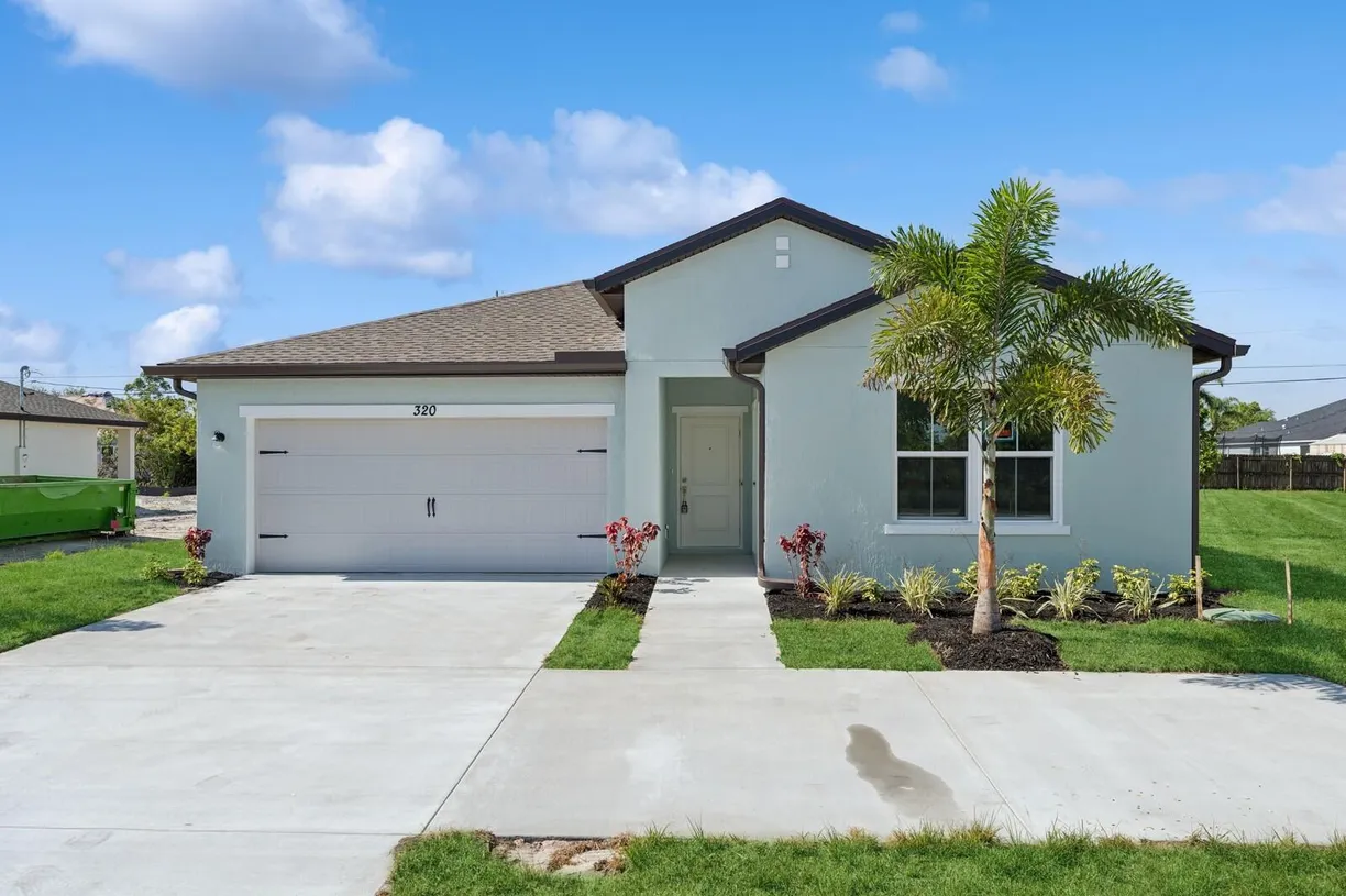 South Florida Real Estate | View 320 SW Becker Road, 15 | 4 Beds, 3 Baths