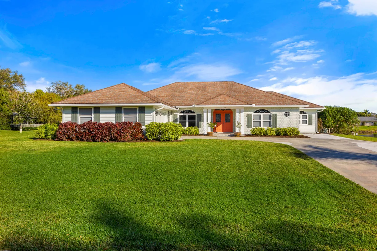 South Florida Real Estate | View 1400 56th Square | 4 Beds, 2 Baths