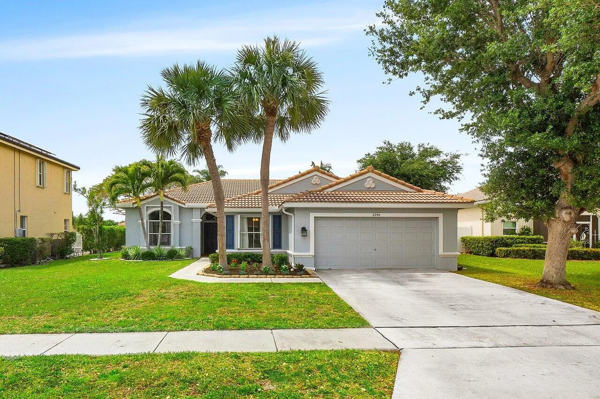 South Florida Real Estate | View 6346 Sand Hills Circle | 4 Beds, 2 Baths