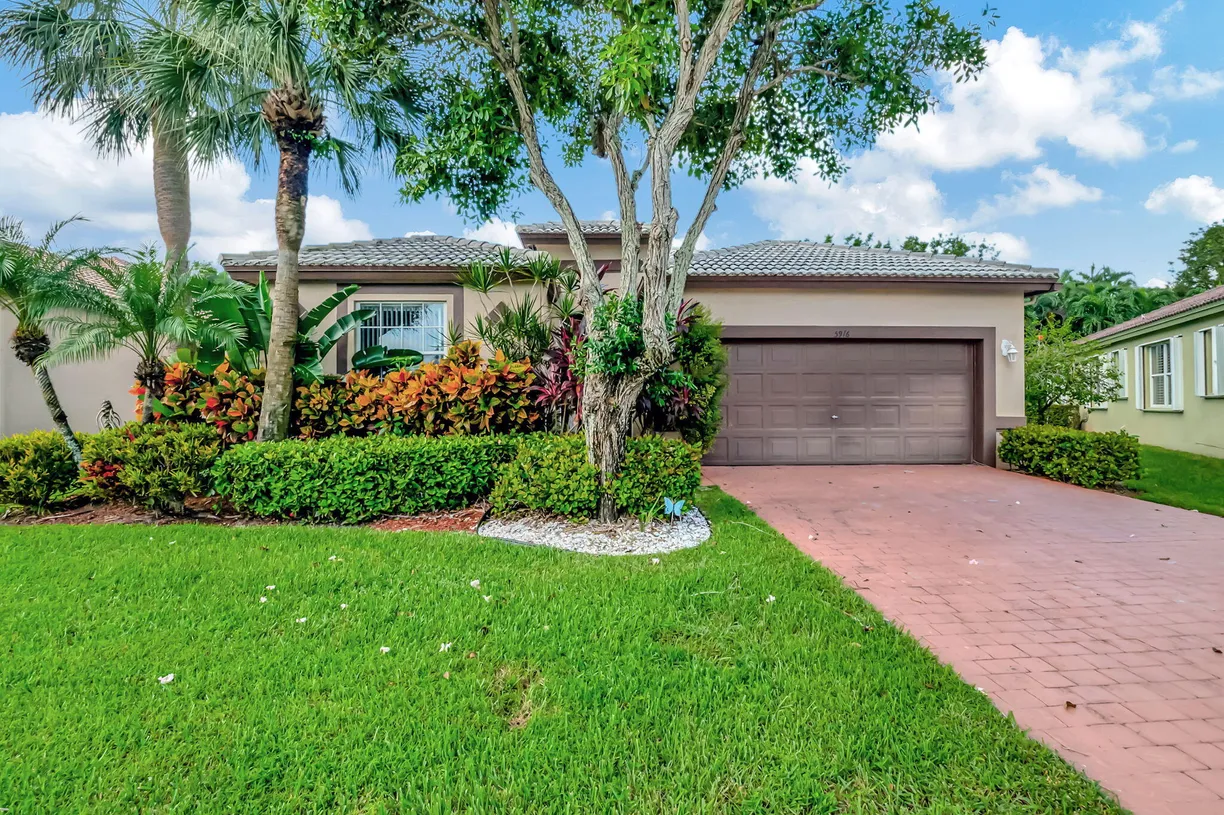 South Florida Real Estate | View 5916 Seashell Terrace | 3 Beds, 2 Baths