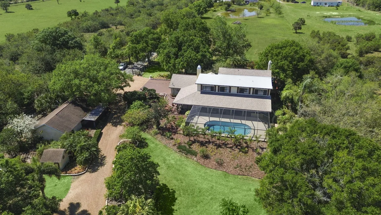 South Florida Real Estate | View 9338 Carlton Road | 4 Beds, 3 Baths