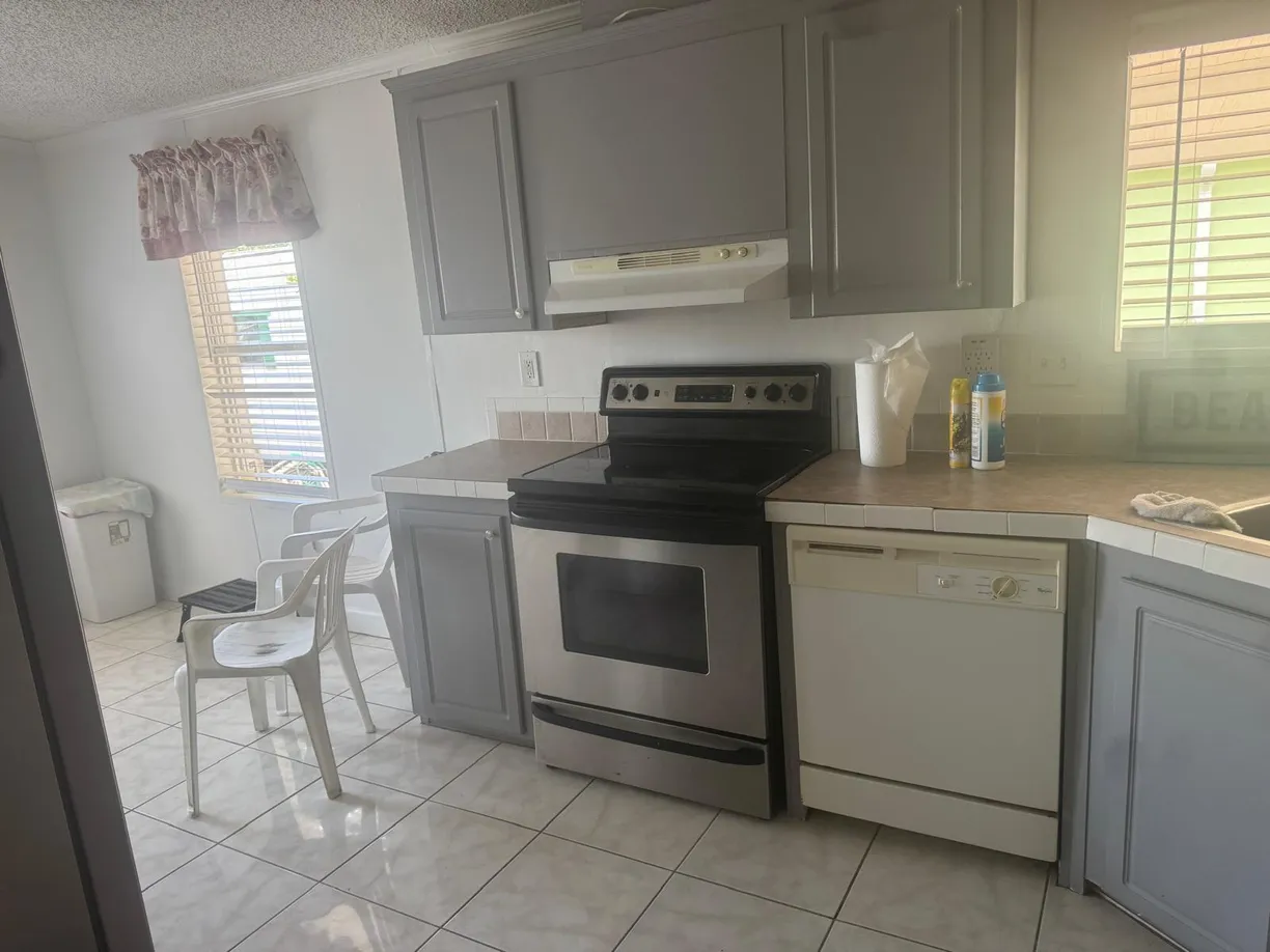 South Florida Real Estate | View 8267 SE Swan Avenue, 8267 | 3 Beds, 2 Baths