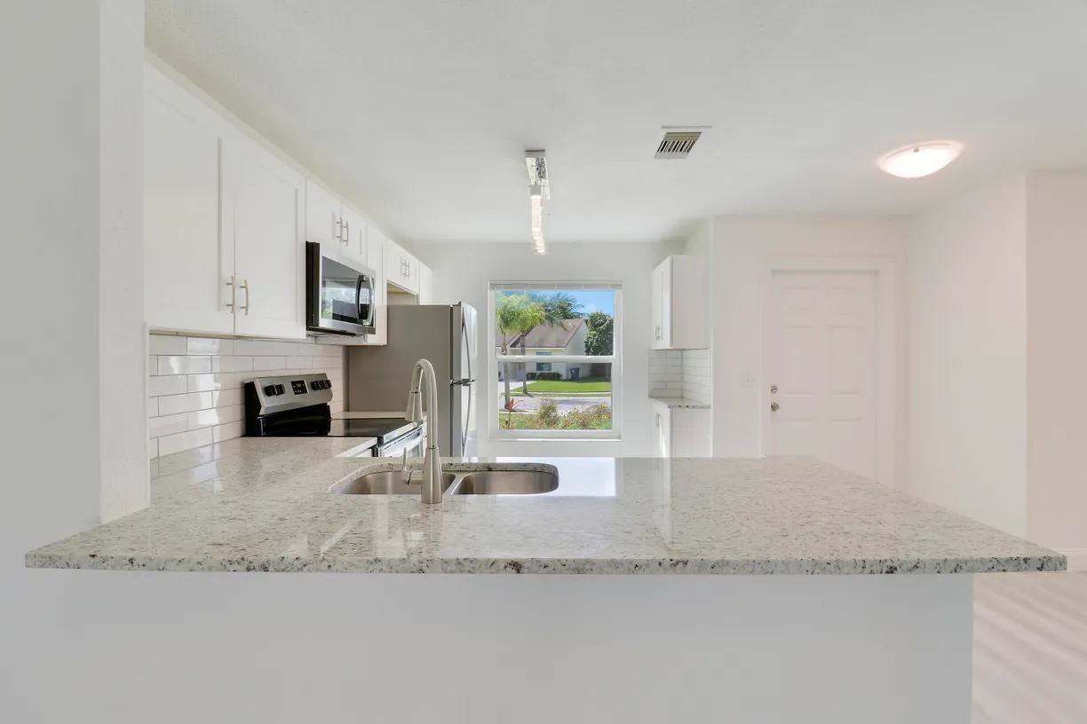 South Florida Real Estate | View 216 Palmetto Court | 2 Beds, 2 Baths