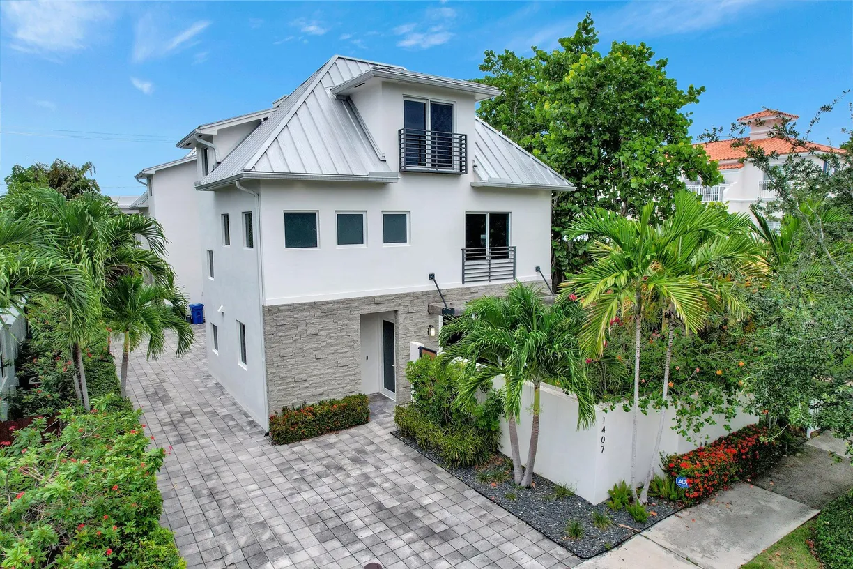 South Florida Real Estate | View 1407 NE 4th Place | 4 Beds, 3 Baths