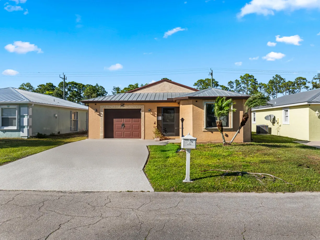 South Florida Real Estate | View 154 Mediterranean Boulevard | 3 Beds, 2 Baths