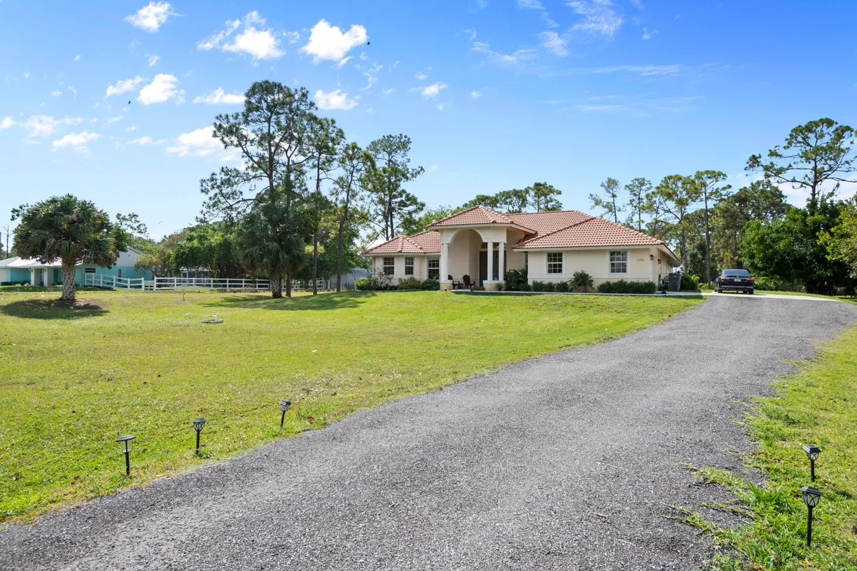 South Florida Real Estate | View 11290 51st Court | 4 Beds, 3 Baths