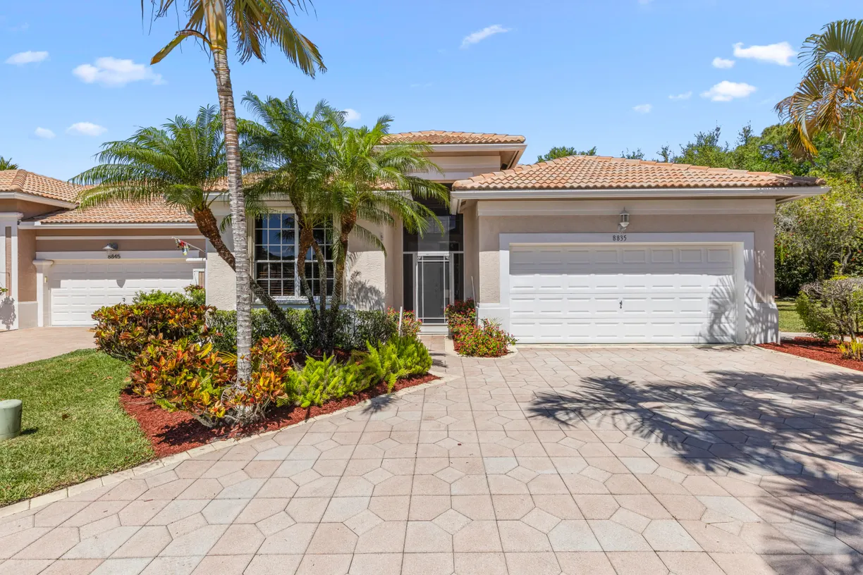 South Florida Real Estate | View 8835 Gibson Cay | 3 Beds, 2 Baths