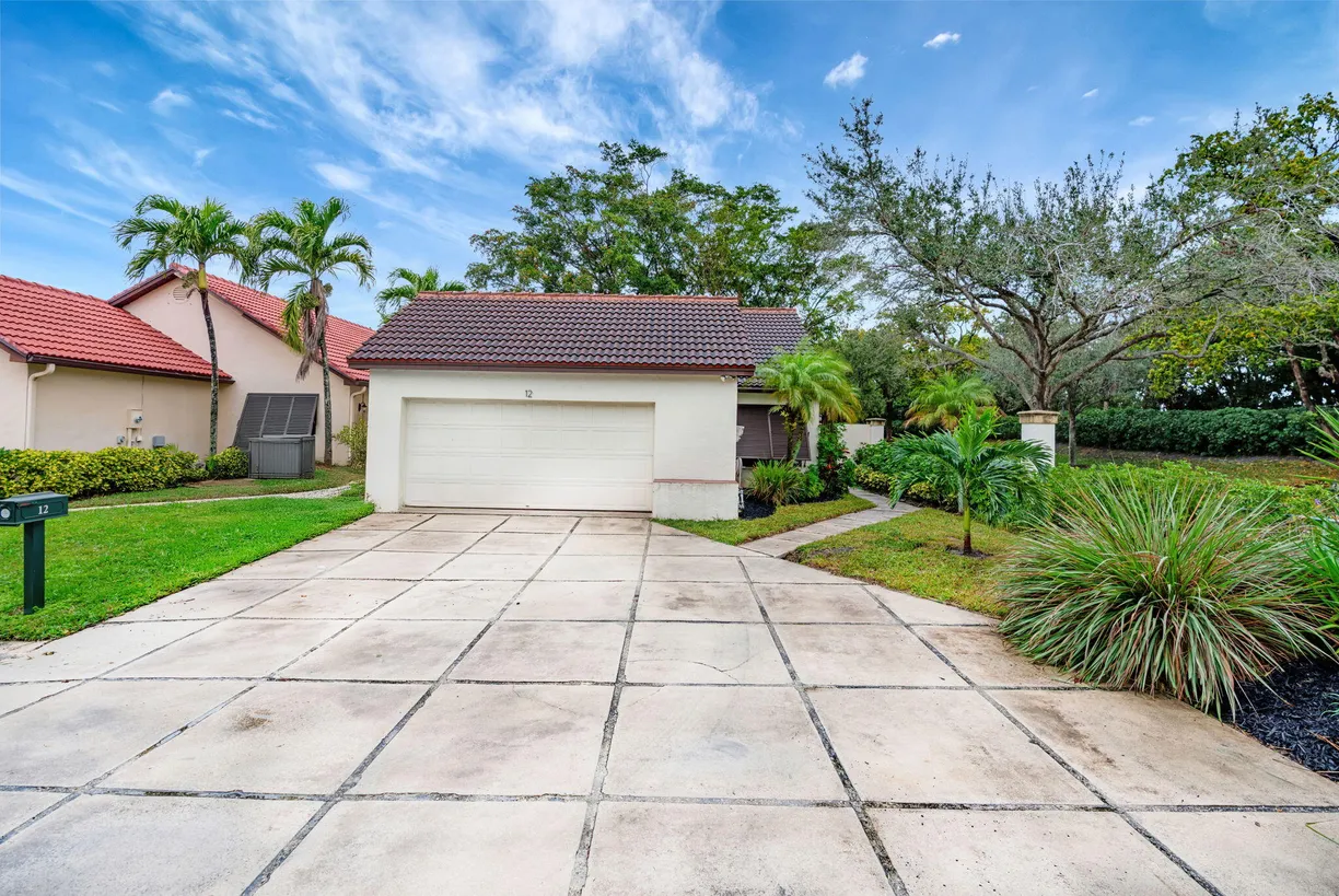 South Florida Real Estate | View 12 N Ironwood Way | 3 Beds, 2 Baths