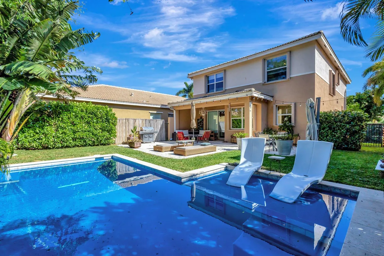 South Florida Real Estate | View 8861 Morgan Landing Way | 4 Beds, 2 Baths