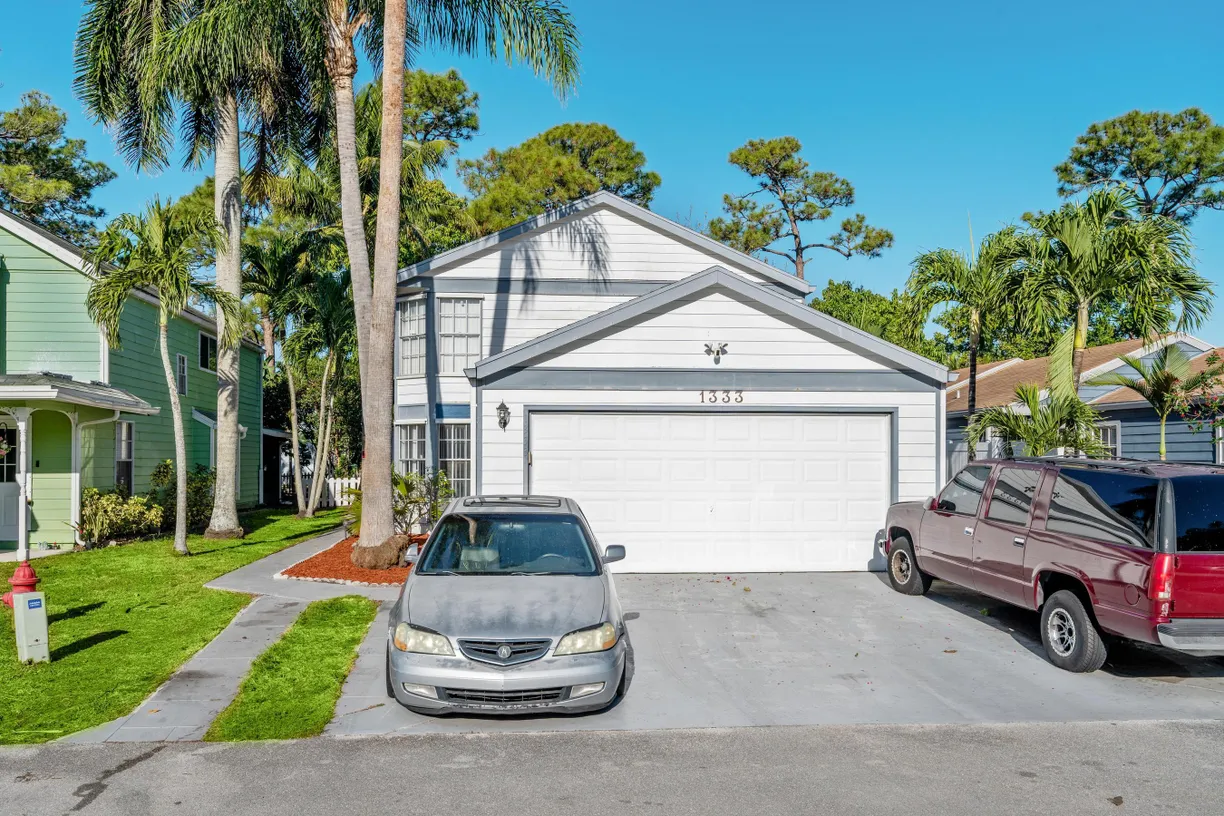South Florida Real Estate | View 1333 Strawberry Lane | 4 Beds, 2 Baths