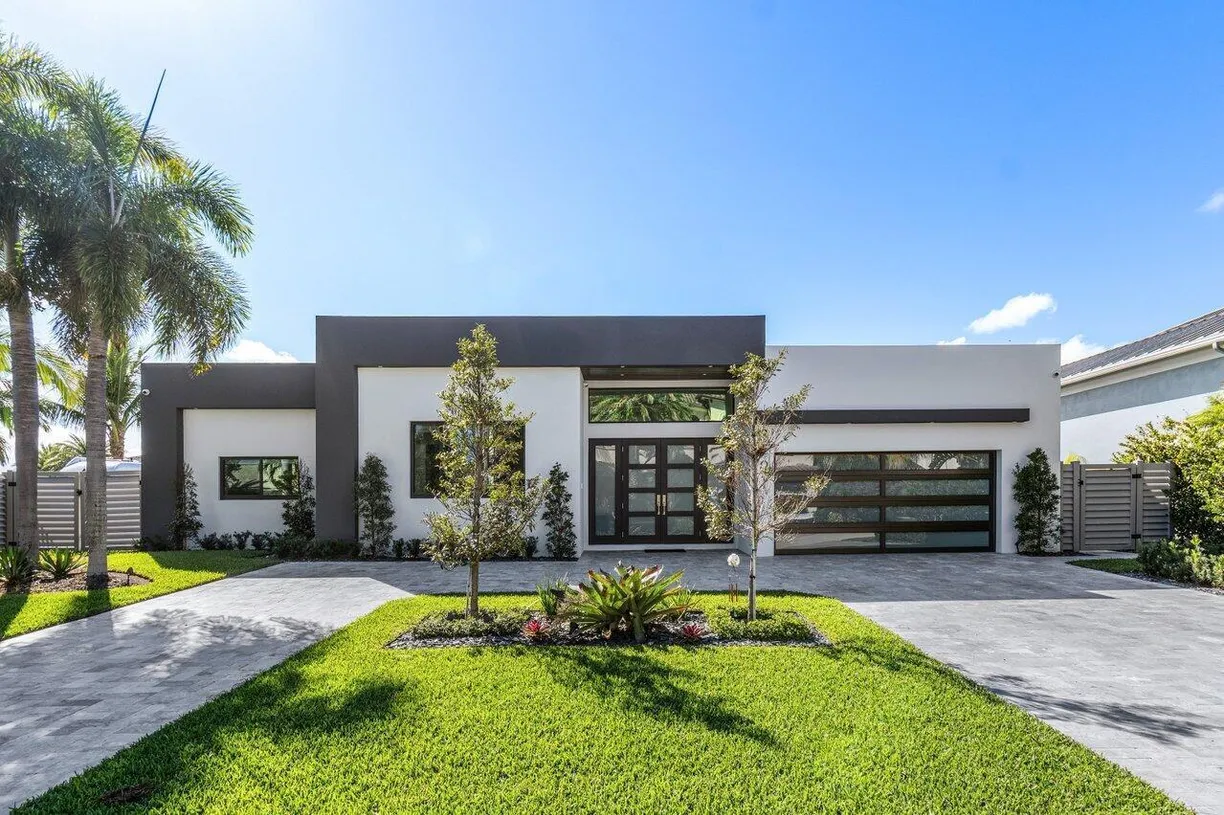 South Florida Real Estate | View 3721 NE 25 Avenue | 4 Beds, 3 Baths