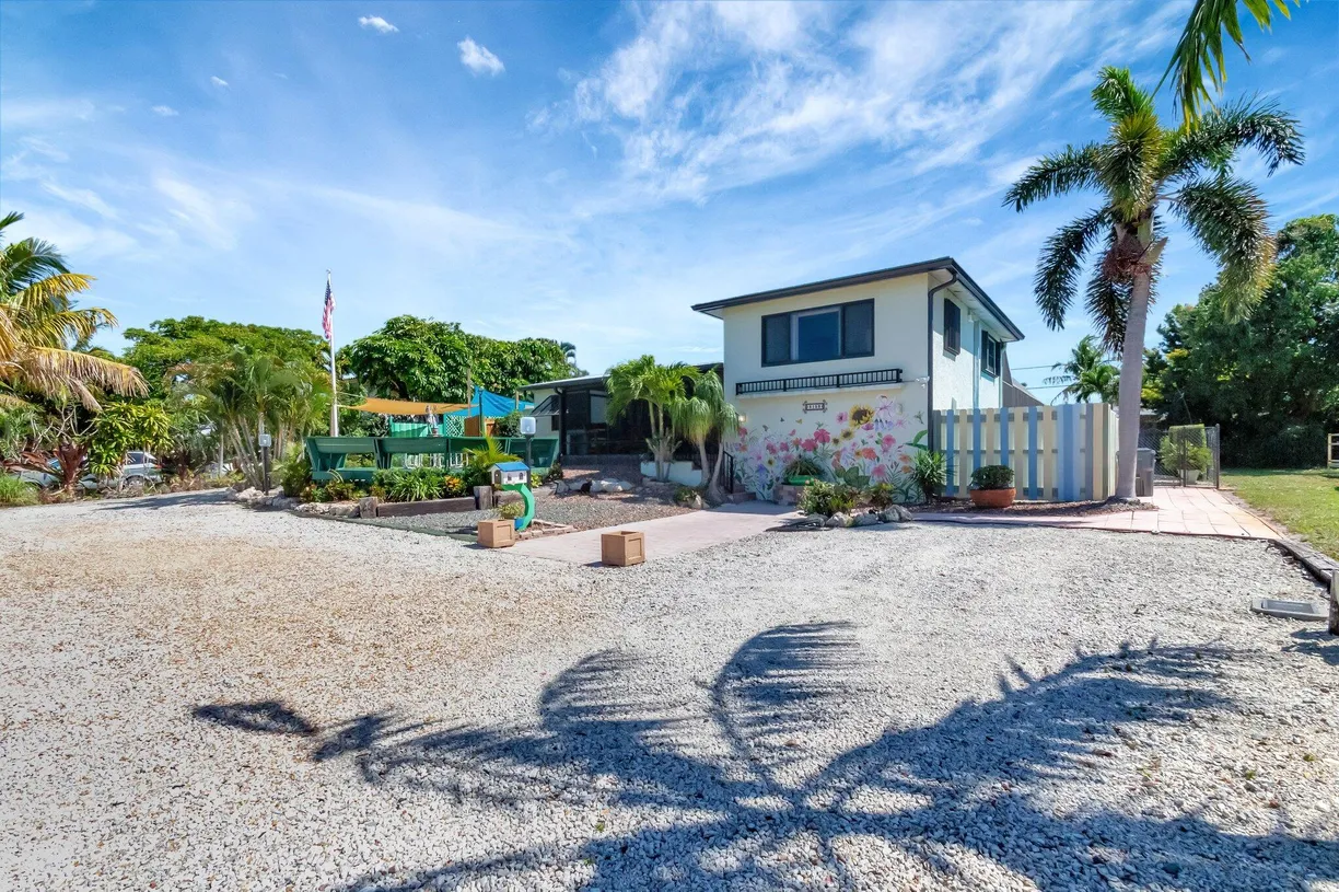 South Florida Real Estate | View 5158 Lake Osborne Drive | 3 Beds, 2 Baths