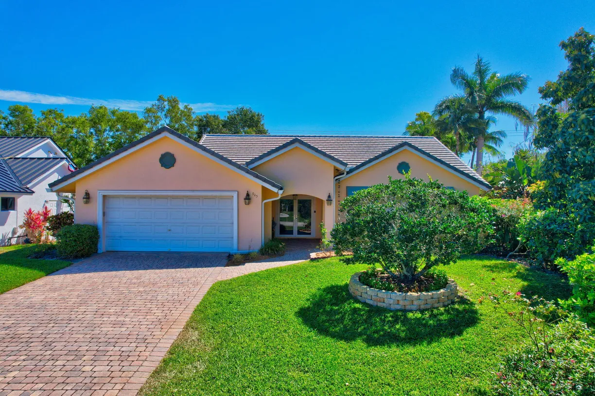 South Florida Real Estate | View 945 Greensward Lane | 3 Beds, 2 Baths