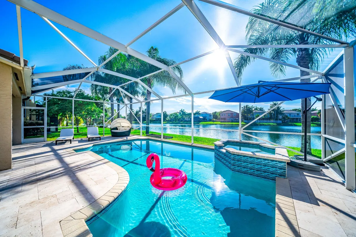 South Florida Real Estate | View 8967 Alexandra Circle | 5 Beds, 2 Baths
