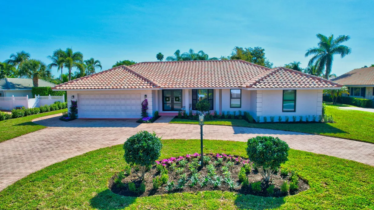 South Florida Real Estate | View 4730 S Lake Drive | 4 Beds, 3 Baths