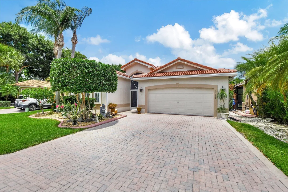 South Florida Real Estate | View 11280 Felice Circle | 3 Beds, 2 Baths