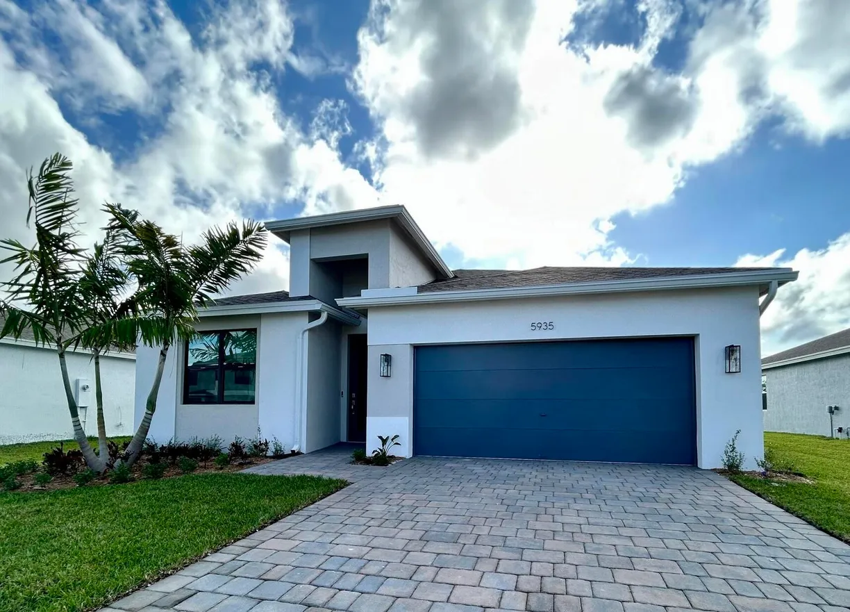 South Florida Real Estate | View 5935 SE Sky Blue Circle | 4 Beds, 2 Baths