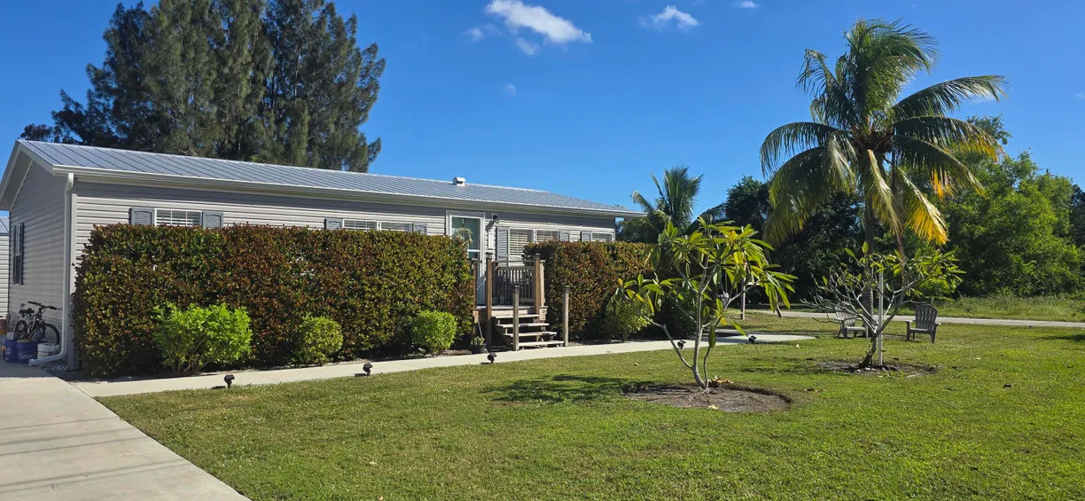 South Florida Real Estate | View 5005 SE Chris Avenue | 3 Beds, 2 Baths