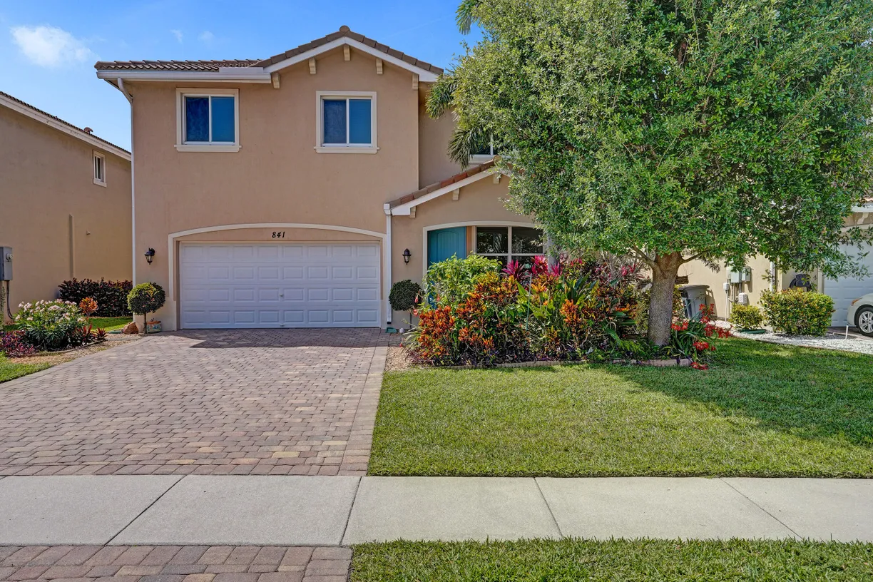 South Florida Real Estate | View 841 Palm Tree Lane | 5 Beds, 3 Baths