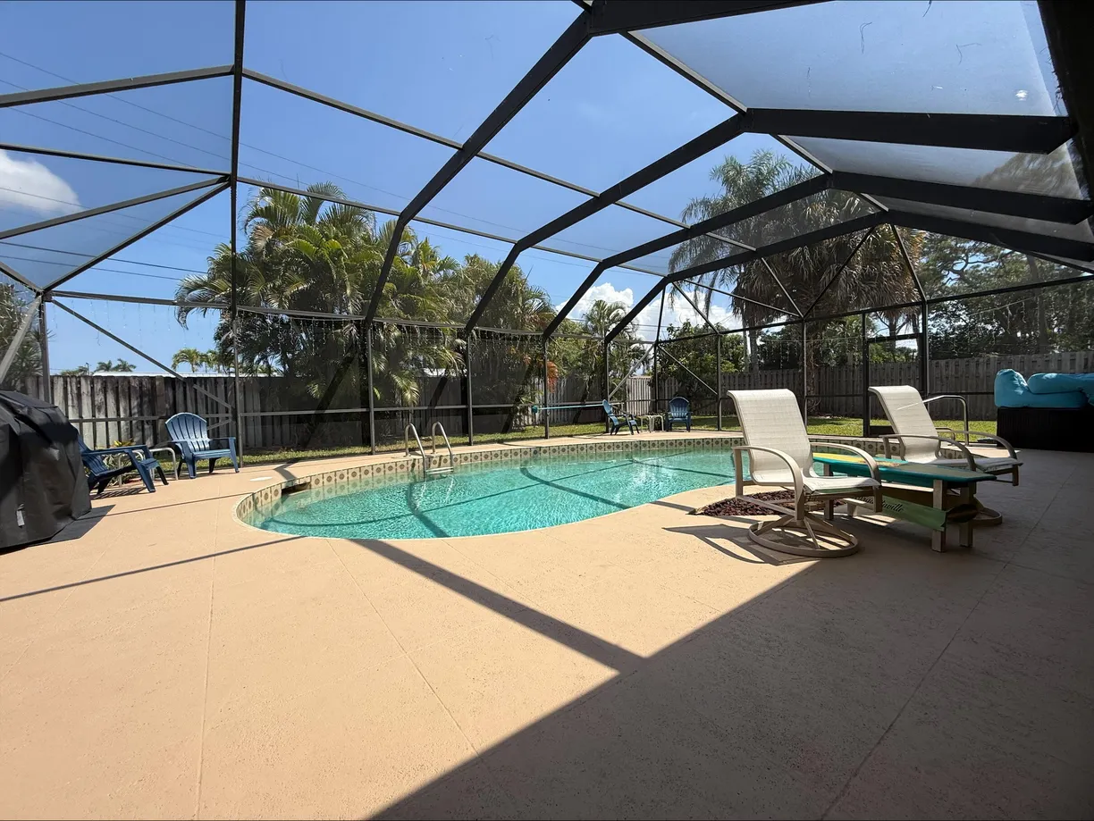 South Florida Real Estate | View 3412 Lake Osborne Drive | 4 Beds, 2 Baths