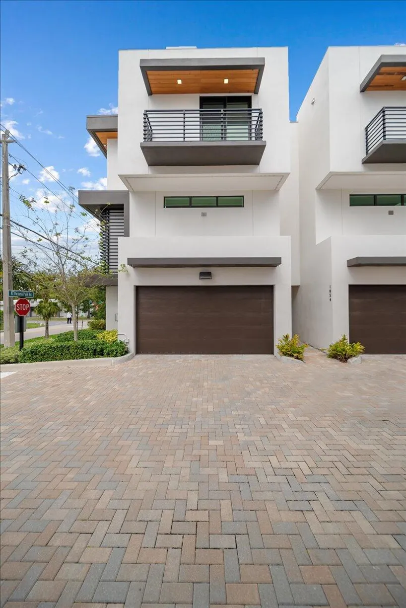 South Florida Real Estate | View 1052 N Victoria Park Road | 3 Beds, 3 Baths