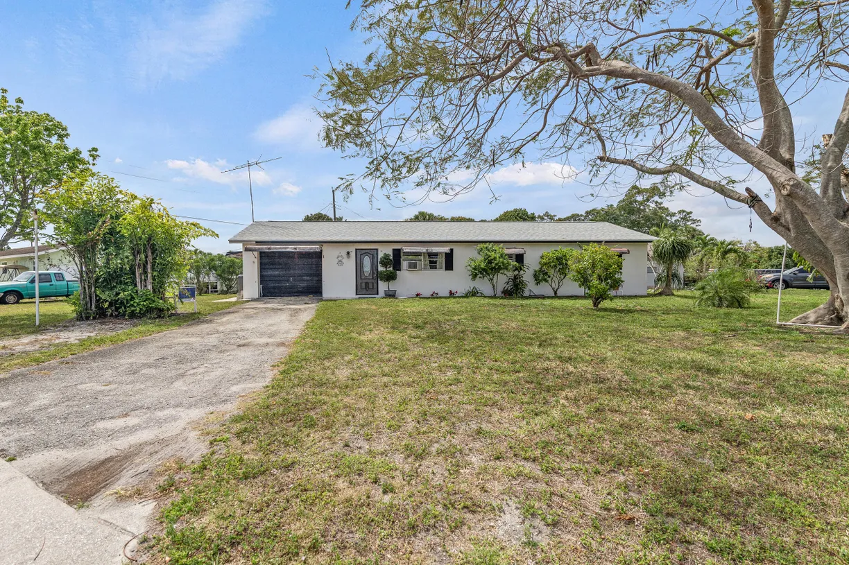 South Florida Real Estate | View 225 Avocado Avenue | 3 Beds, 2 Baths
