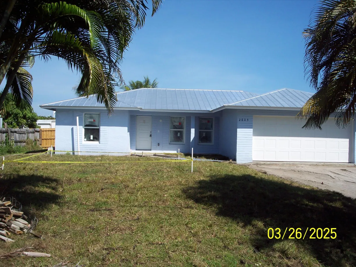South Florida Real Estate | View 2805 SE Carroll Street | 3 Beds, 2 Baths