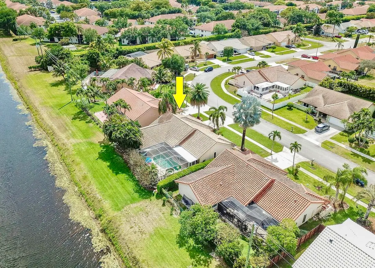South Florida Real Estate | View 9494 Sun Pointe Drive | 4 Beds, 2 Baths