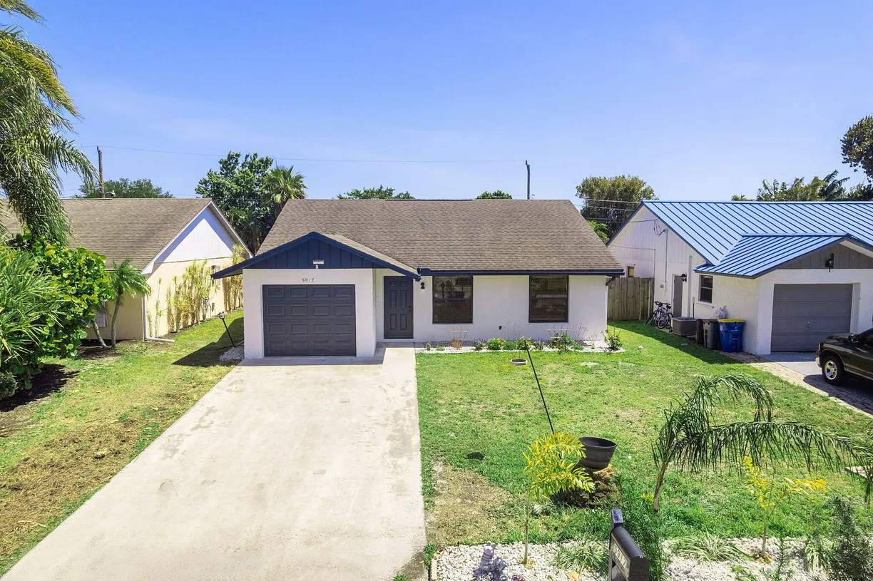 South Florida Real Estate | View 5917 SE Collins Avenue | 3 Beds, 2 Baths