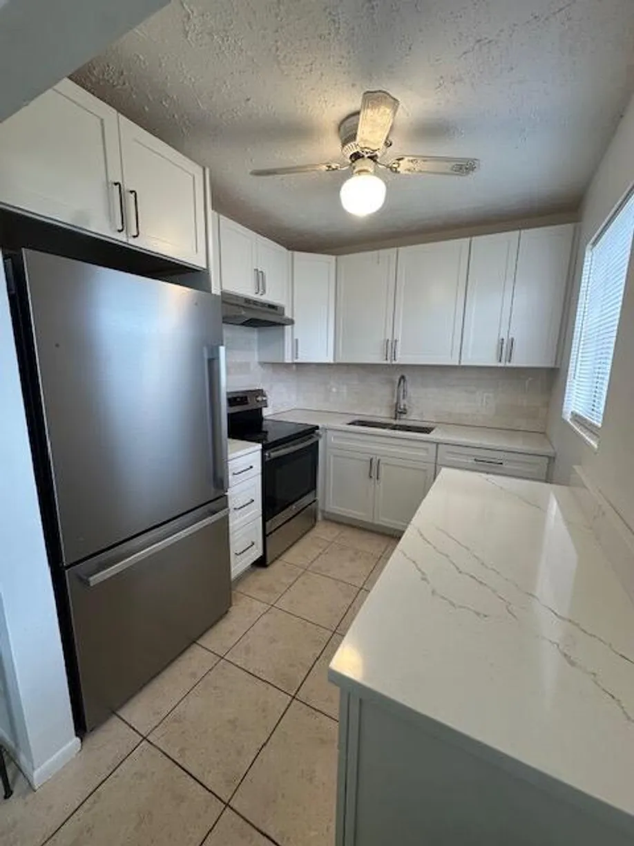 South Florida Real Estate | View 72 Norwich C | 2 Beds, 1 Bath
