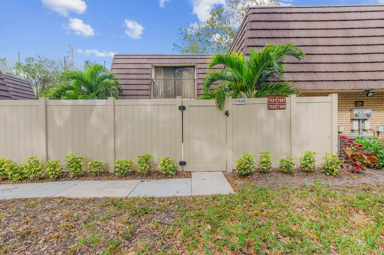 South Florida Real Estate | View 7520 75th Way | 2 Beds, 2 Baths