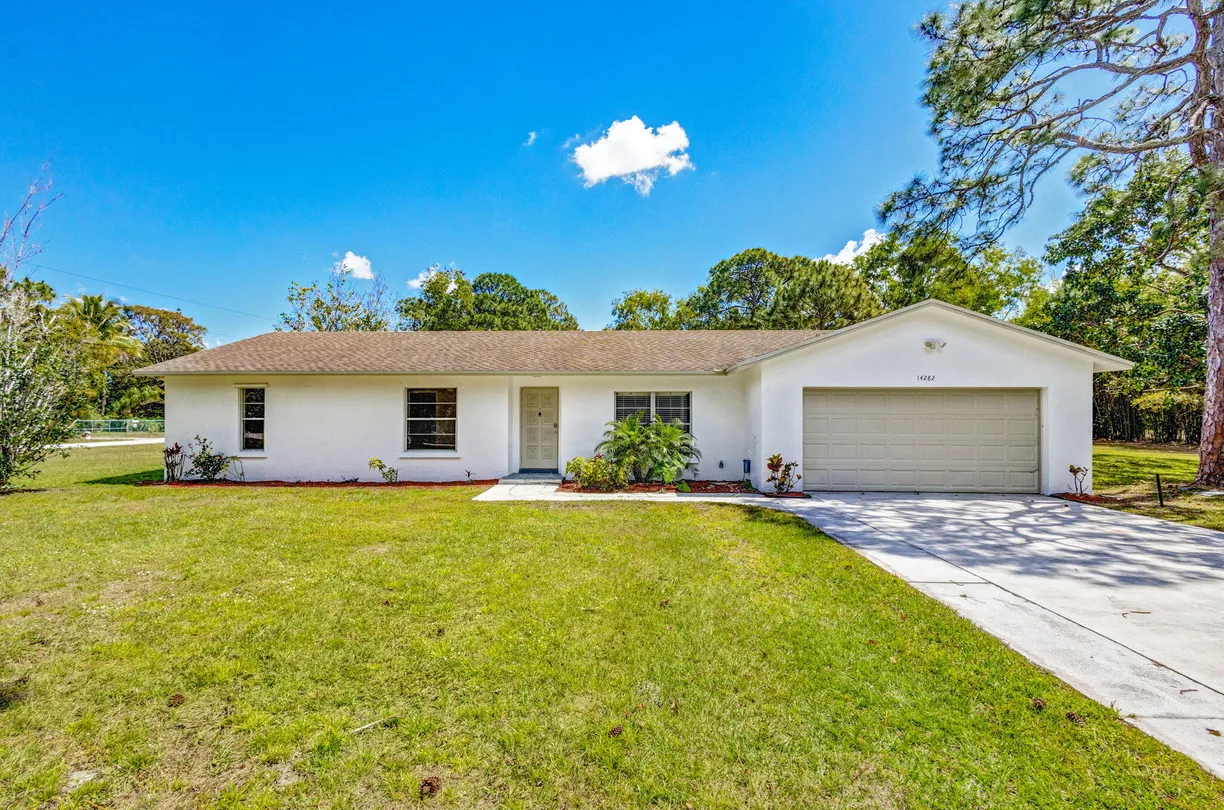South Florida Real Estate | View 14282 64th Drive | 3 Beds, 2 Baths